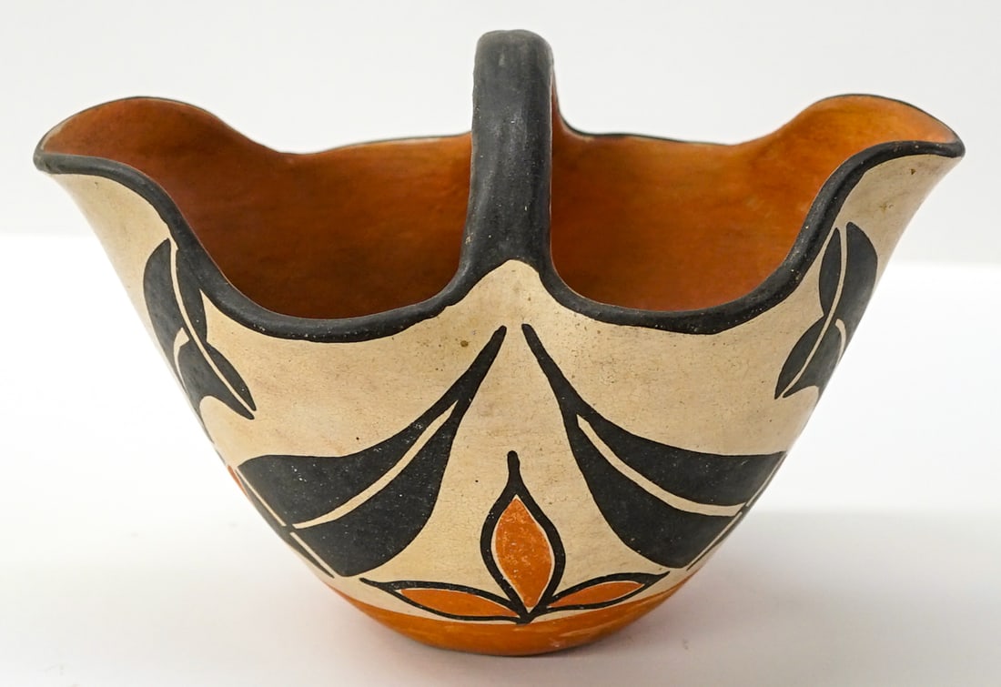 Polychrome Pottery Basket [Native American]: Pottery basket measures 5.5 in. high x 8.25 in. wide x 5.25 in. deep. Unsigned. Pottery measures 5.5 in. H x 8.25 in. W x 5.25 in. D for shipping purposes only. The absence of a condition report does 