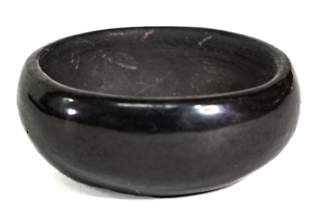 Rose Gonzales (San Ildefonso) Blackware Mini Bowl: Rose Gonzales (San Ildefonso) miniature blackware bowl. Signed underside. Measures .75 in. high x 2.25 in. wide. No evident cracks or repairs. Pottery measures .75 in. H x 2.25 in. W x 2.25 in. D for
