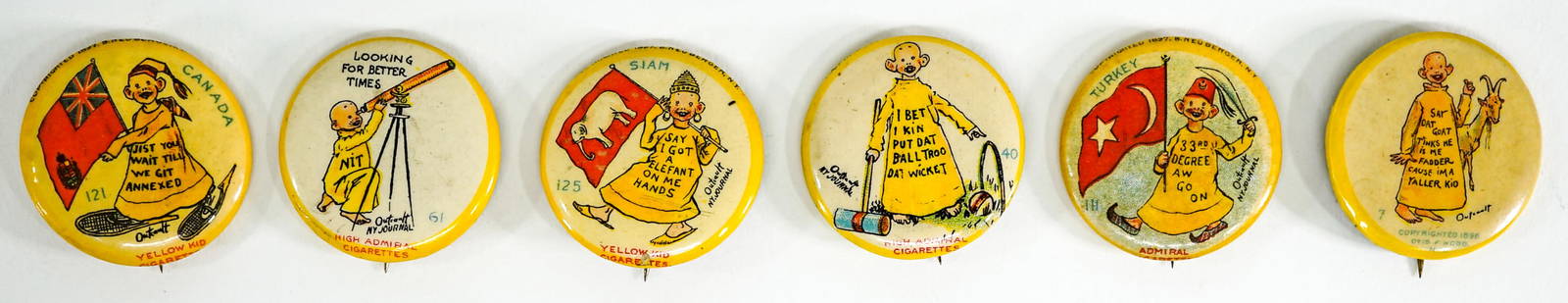 R. F. Outcault's Yellow Kid Pinback Buttons (5): They measure 1.25 inches diameter. Very good to excellent condition. R. F. Outcault's Yellow Kid was the first comic character superstar! He not only proved that a comic character could sell newspaper