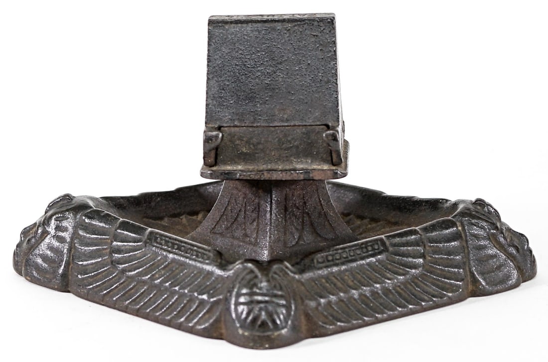 Art Deco Cast Iron Matchbox Holder: Art Deco cast iron matchbox holder measures 7.25 in. x 5.5 in. x 3.5 in. high. Lot measures 3.5 in. H x 7.25 in. W x 5.5 in. D for shipping purposes only. The absence of a condition report does not im