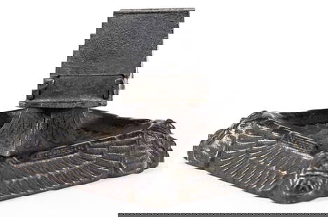 Art Deco Cast Iron Matchbox Holder: Art Deco cast iron matchbox holder measures 7.25 in. x 5.5 in. x 3.5 in. high. Lot measures 3.5 in. H x 7.25 in. W x 5.5 in. D for shipping purposes only. The absence of a condition report does not im