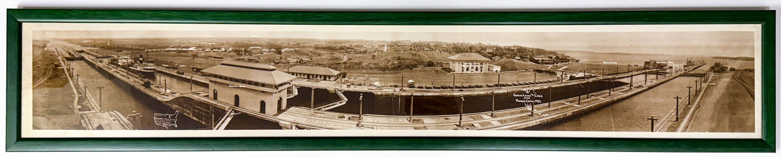 1927 Panama Canal Real Photo Panoramic Photo: 1927 Panama Canal Real Photo Panoramic Photo by National Photo Service (Gatun Lock and Lake). Measures 8 x 49.5 inches image size. Professionally framed under plexiglass and measures 9.375 x 51 x .5 i