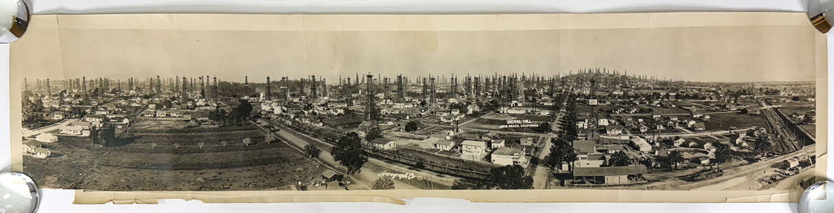 Signal Hill, Long Beach, California Birdseye View: Signal Hill, Long Beach, California Birdseye View Panoramic Real Photo. Measures 8 x 34.5 inches, unframed. There are several creases from the top edge down, paper loss lower margin. The absence of a