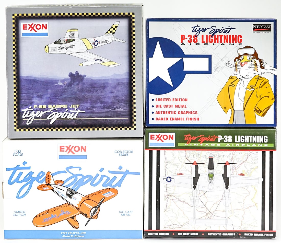 Exxon Tiger Spirit Model Airplane Coin Banks MIB: Four (4) Spec Cast Exxon Tiger Spirit airplane coin banks. Includes: F-86 Sabre; (2) P-38 Lightning; 1929 Travel Air. All MIB. Lot measures 16 in. H x 13 in. W x 11.5 in. D for shipping purposes only.