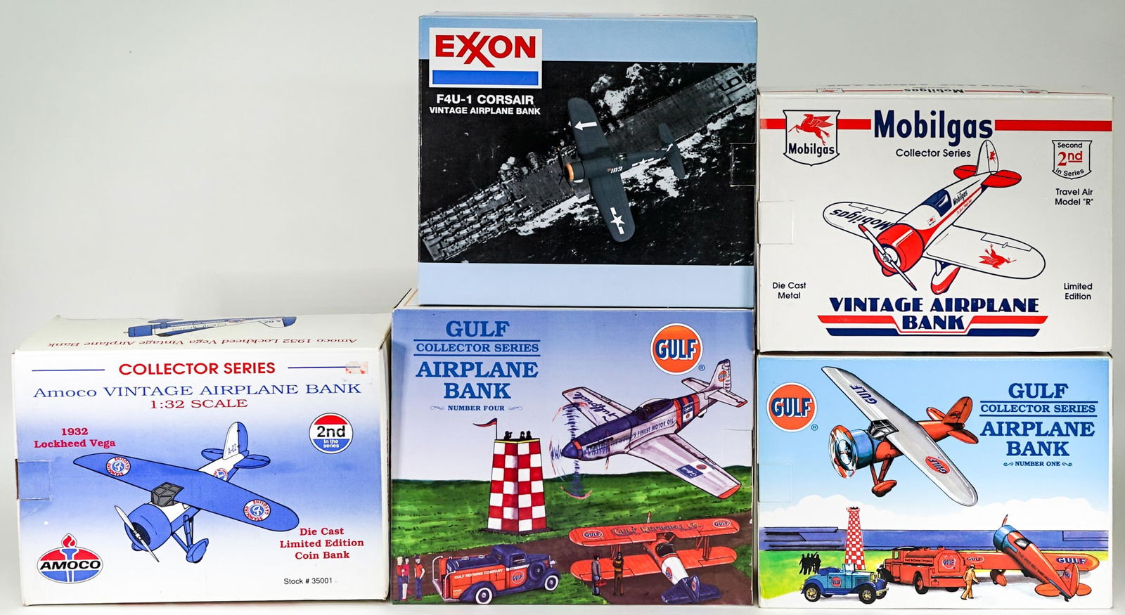 Spec Cast Model Airplane Coin Banks MIB: Five (5) SPEC CAST Collector Series die cast model airplane banks include: Gulf 47007; Gulf 35006; Mobilgas 40004; Amoco 35001; Exxon Tiger Spirit 47501. All MIB. Lot measures 16 in. H x 13 in. W x 12