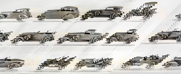 Collection Fine Pewter Scale Model Cars: Collection Fine Pewter Scale Model Cars. The absence of a condition report does not imply that the lot is in perfect condition or completely free from wear and tear, imperfections, or the conditions o