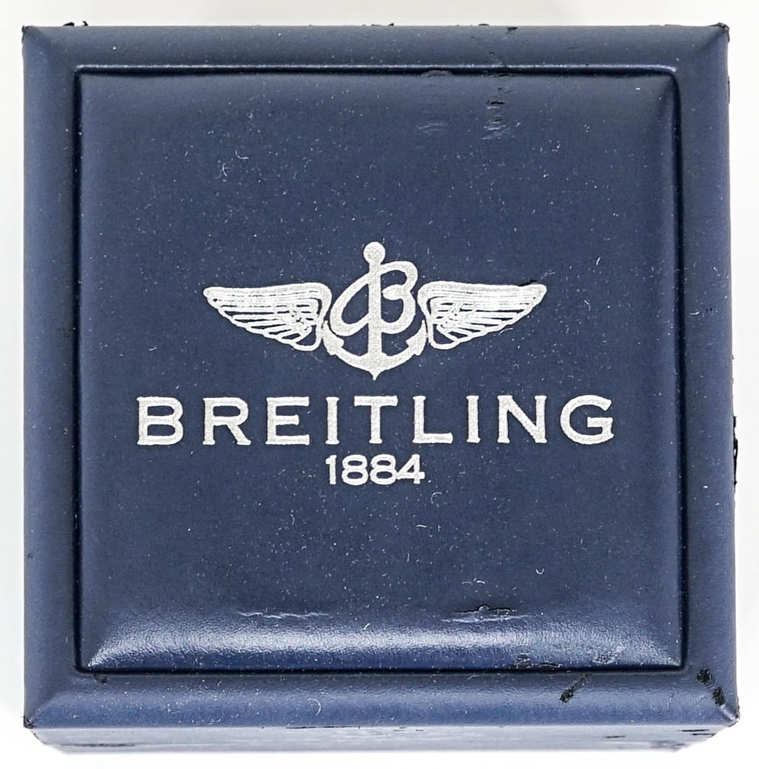 Breitling 1884 BOX ONLY: Breitling 1884 BOX ONLY. Measures 5.25 in. H x 5.25 in. W x 3.75 in. D. The absence of a condition report does not imply that the lot is in perfect condition or completely free from wear and tear, imp