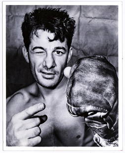 Rocky Graziano Type I Original 8x10 Photo PSA LOA: Rocky Graziano 'Type I' original 8x10 photo. Circa 1950's. PSA LOA #1P18827. Photo lot measures 11 H x 8.5 in. W for shipping purposes only. Provenance: Estate of Gordon Pouliot (1927-2004). Mr. Pouli