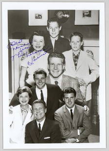 Harriet Nelson 5x7 Family Photo SIGNED BAS COA: Harriet Nelson (Ozzie and Harriet) 5x7 signed and inscribed photo with family. Beckett Authentication Services BAS COA #BS27493. Photo measures 5 H x 7 in. W for shipping purposes only. The absence of