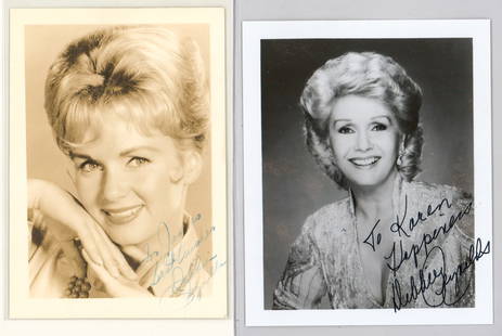 Debbie Reynolds Autographed Photos (2): They measure 5 x 3.5 inches and 5 x 4 inches. Authenticated by Beckett Authentication Services. The absence of a condition report does not imply that the lot is in perfect condition or completely free