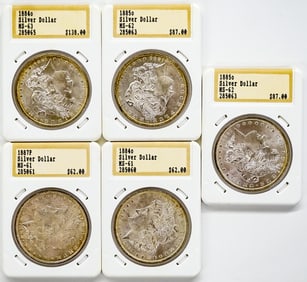 Five Graded U.S. Morgan Silver Dollars