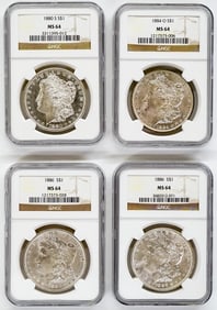 Four Graded U.S. Morgan Silver Dollars
