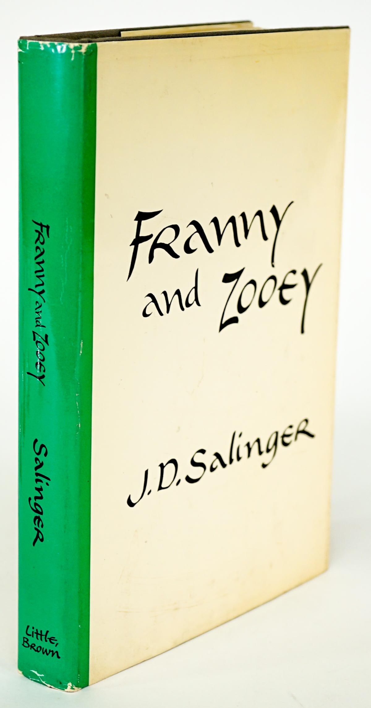 Franny and Zooey by Salinger 1961 1st: Franny and Zooey by J. D. Salinger. 1961 stated 1st edition with unclipped dust jacket. Brown and Co., Boston. 201 pp. Gray cloth covers with light scar on front cover. Lightly or never read. Book mea