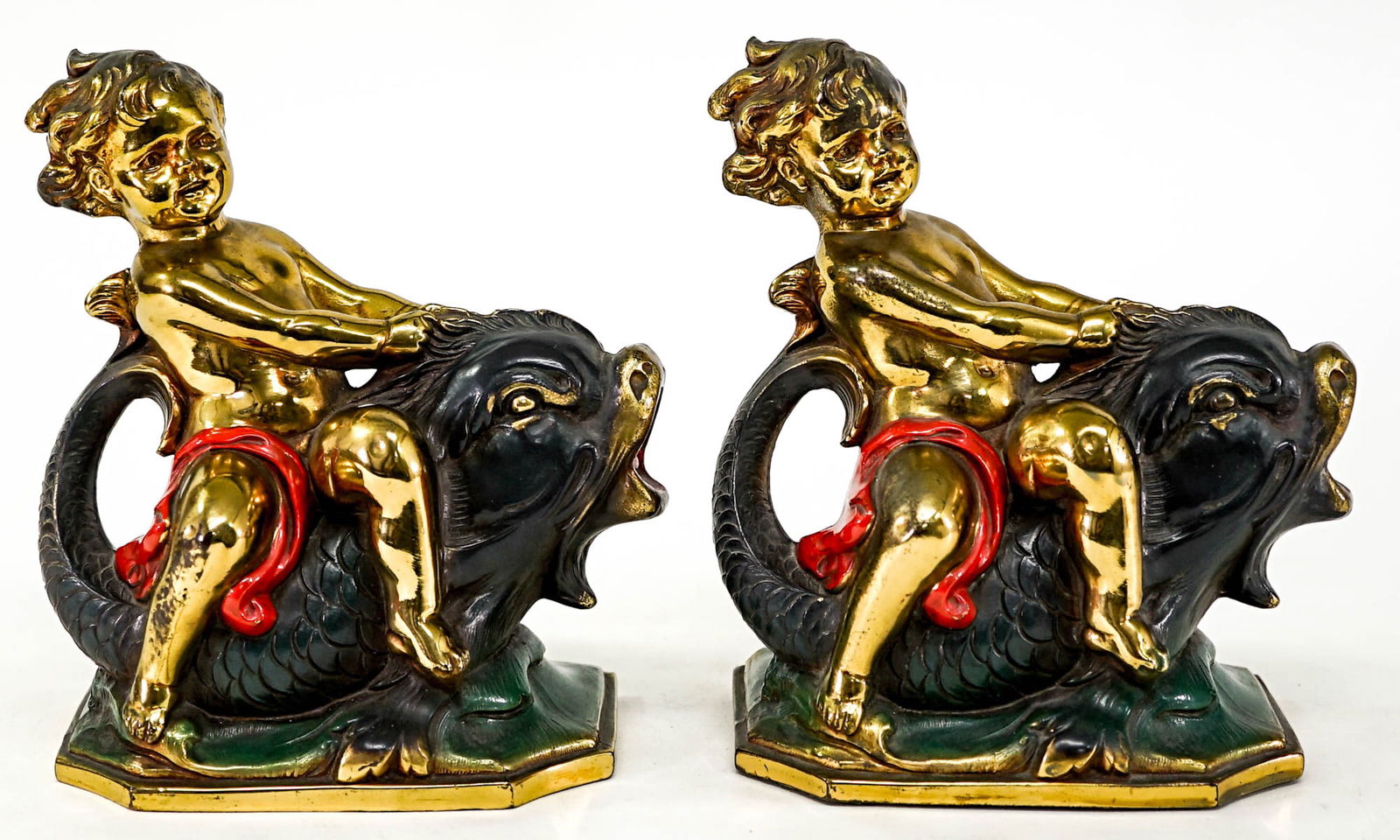 Cherub / Fish Pair Bookends Spelter /White Metal: Spelter / White Metal clad bookends. Each bookend measures 6.75 x 6 x 3.125 inches. Some scratches. The absence of a condition report does not imply that the lot is in perfect condition or completely