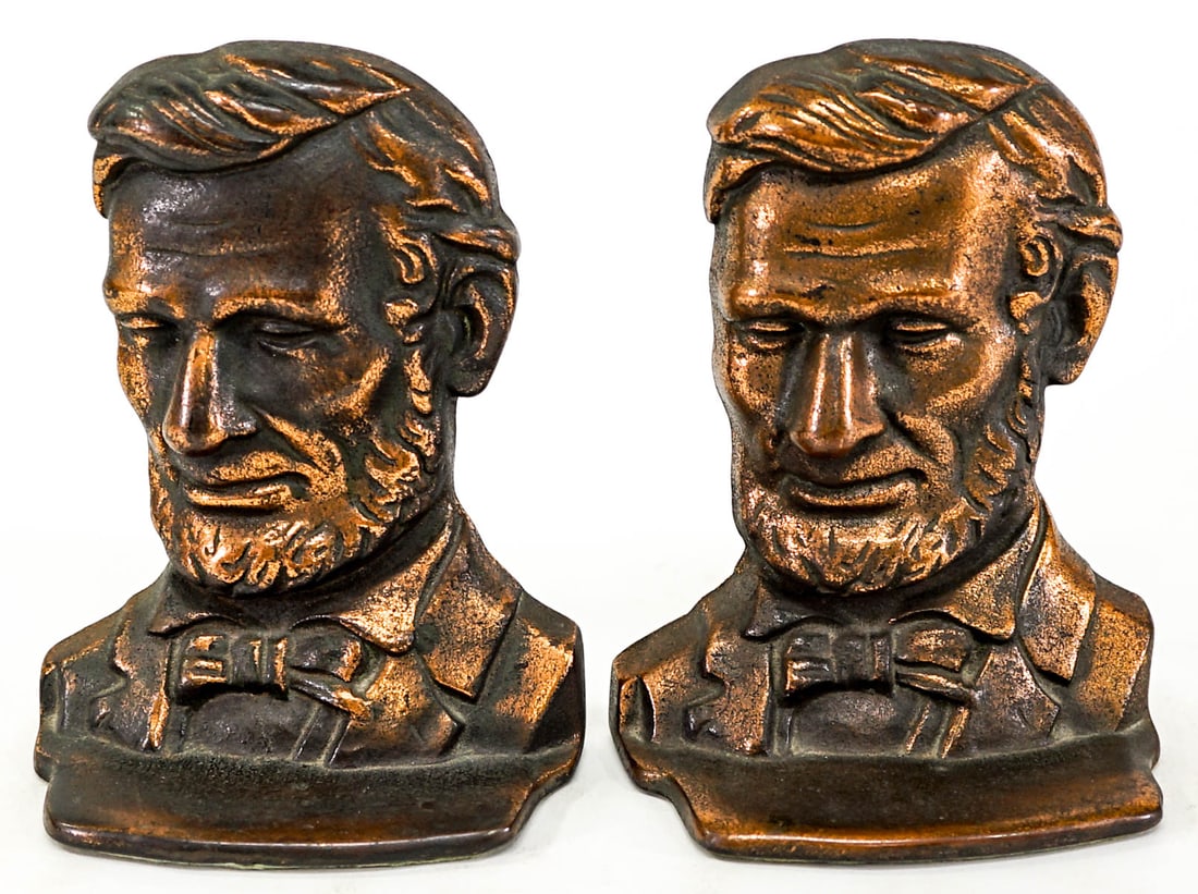 Abe Lincoln Cast Iron Pair Bookends: Each bookend measures 6 x 4.5 x 2.5 inches. No damage. The absence of a condition report does not imply that the lot is in perfect condition or completely free from wear and tear, imperfections, or th