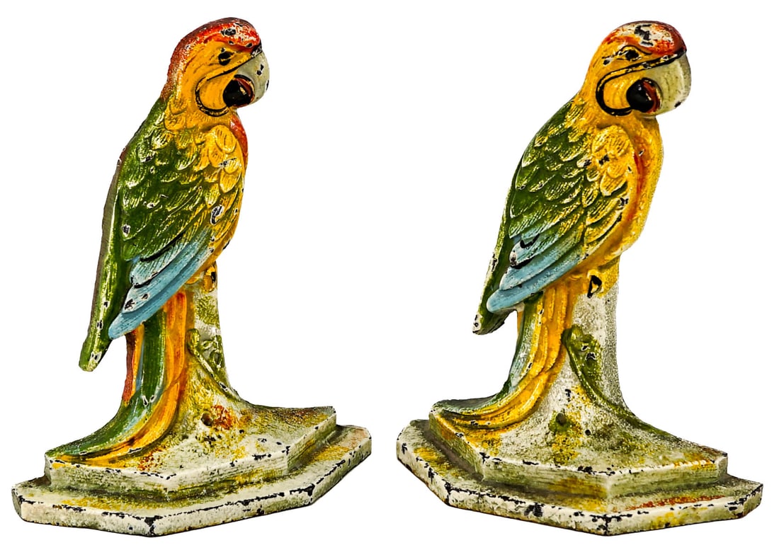 Cast Iron Pair Bookends [Parrot]: Each bookend measures 6.5 x 5.25 x 2 inches. No visible damage other than paint loss. The absence of a condition report does not imply that the lot is in perfect condition or completely free from wear