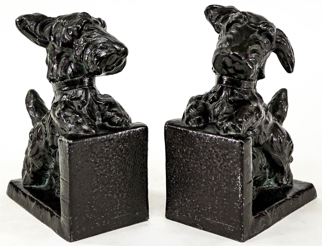 AMW - Newark NJ Pair Bookends Scottie/Terrier Dog: AMW Hollow-cast pair bookends. Each bookend measures 6.875 x 3 x 5 inches. No damage. The absence of a condition report does not imply that the lot is in perfect condition or completely free from wear