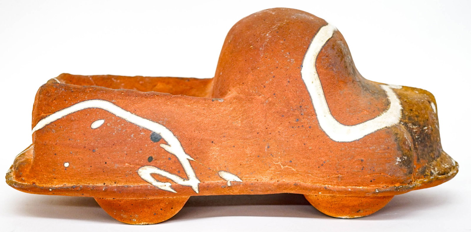 An Unsigned Ceramic Pickup: Measures 6.75 x 15.5 x 7.5 inches. No damage or repairs. Excellent condition. The absence of a condition report does not imply that the lot is in perfect condition or completely free from wear and tea