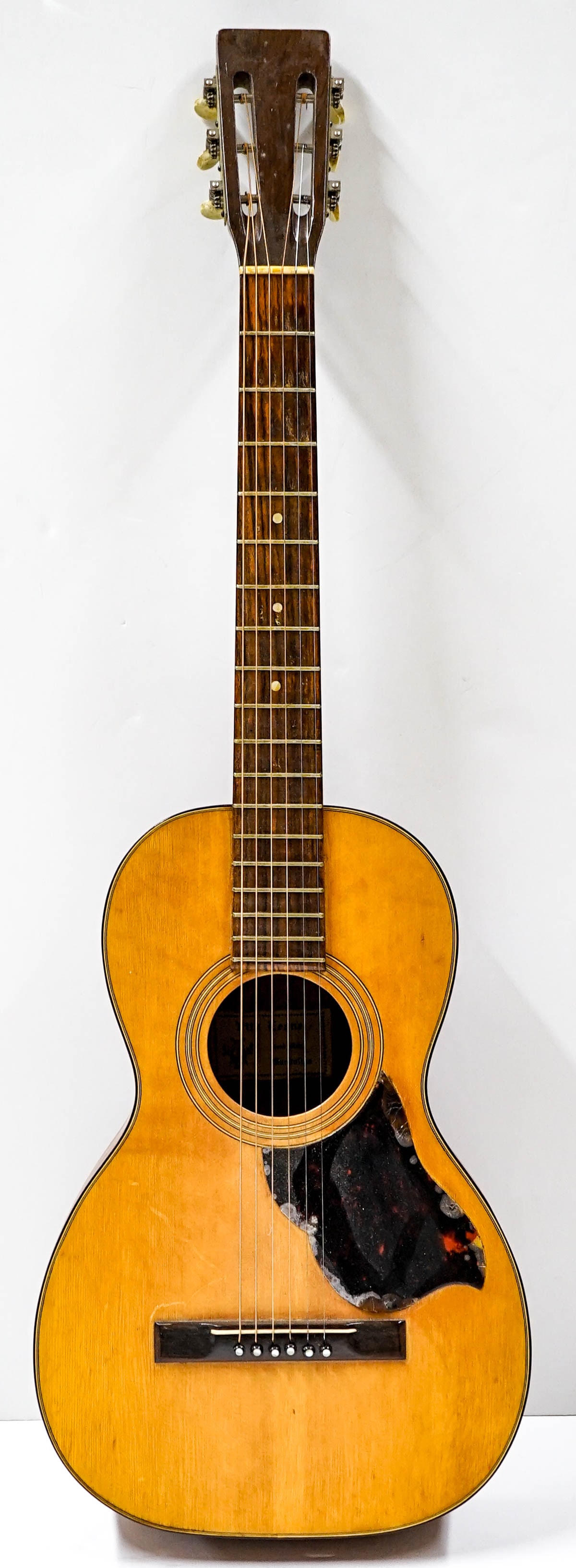 Vito Leone Small Guitar: All wood components have been refinished, pick guard as-is. Measures 37.5 x 12.25 x 4 inches. The absence of a condition report does not imply that the lot is in perfect condition or completely free f
