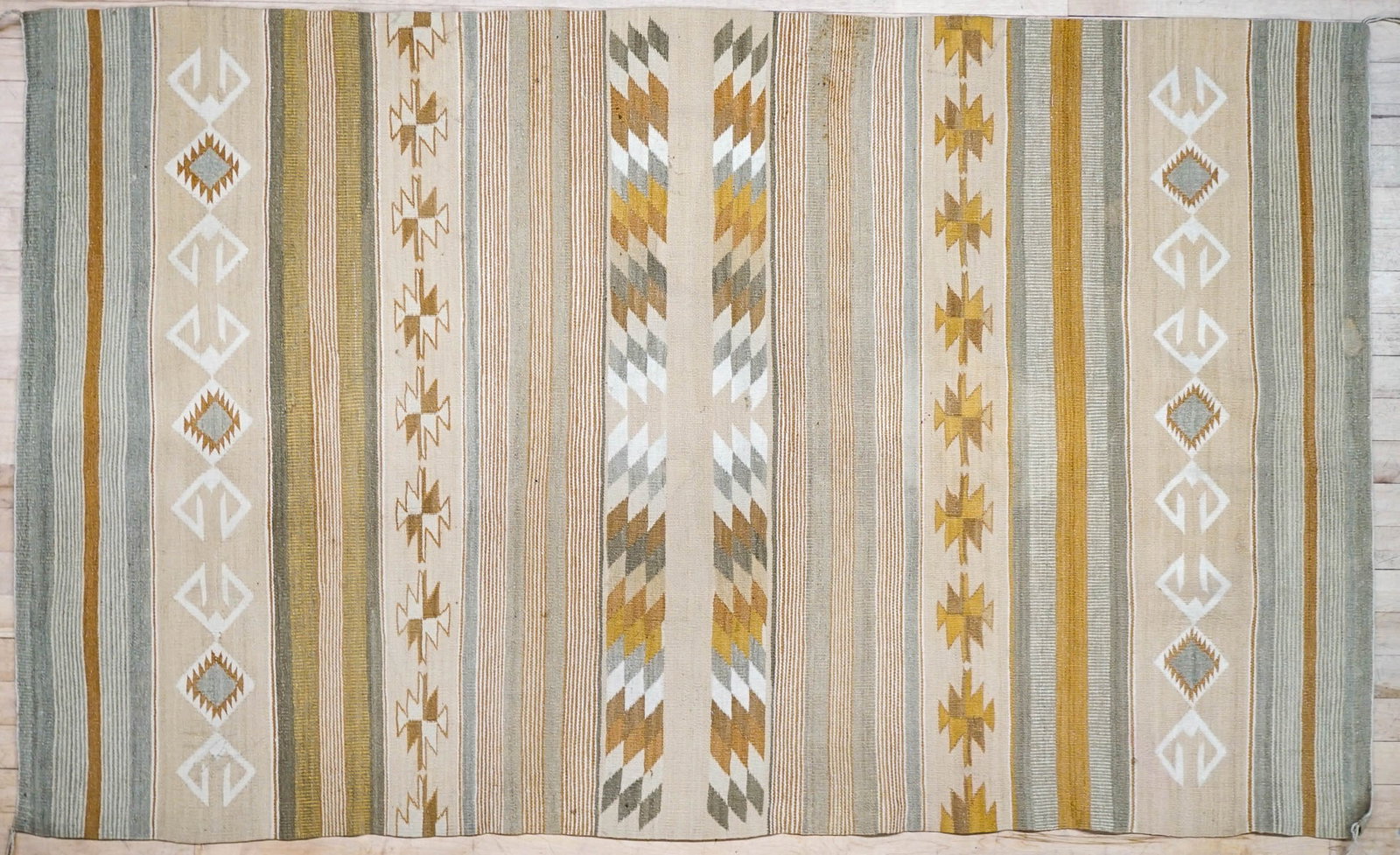 Navajo Vintage Rug [Chinle] [Crystal]: Navajo Vintage Rug [Chinle] [Crystal]. This vintage Navajo rug measures 43.5 x 70.5 inches.VG-EX condition. There are a few small, light stains. Consignor notes: Purchased by consignor's grandparents 