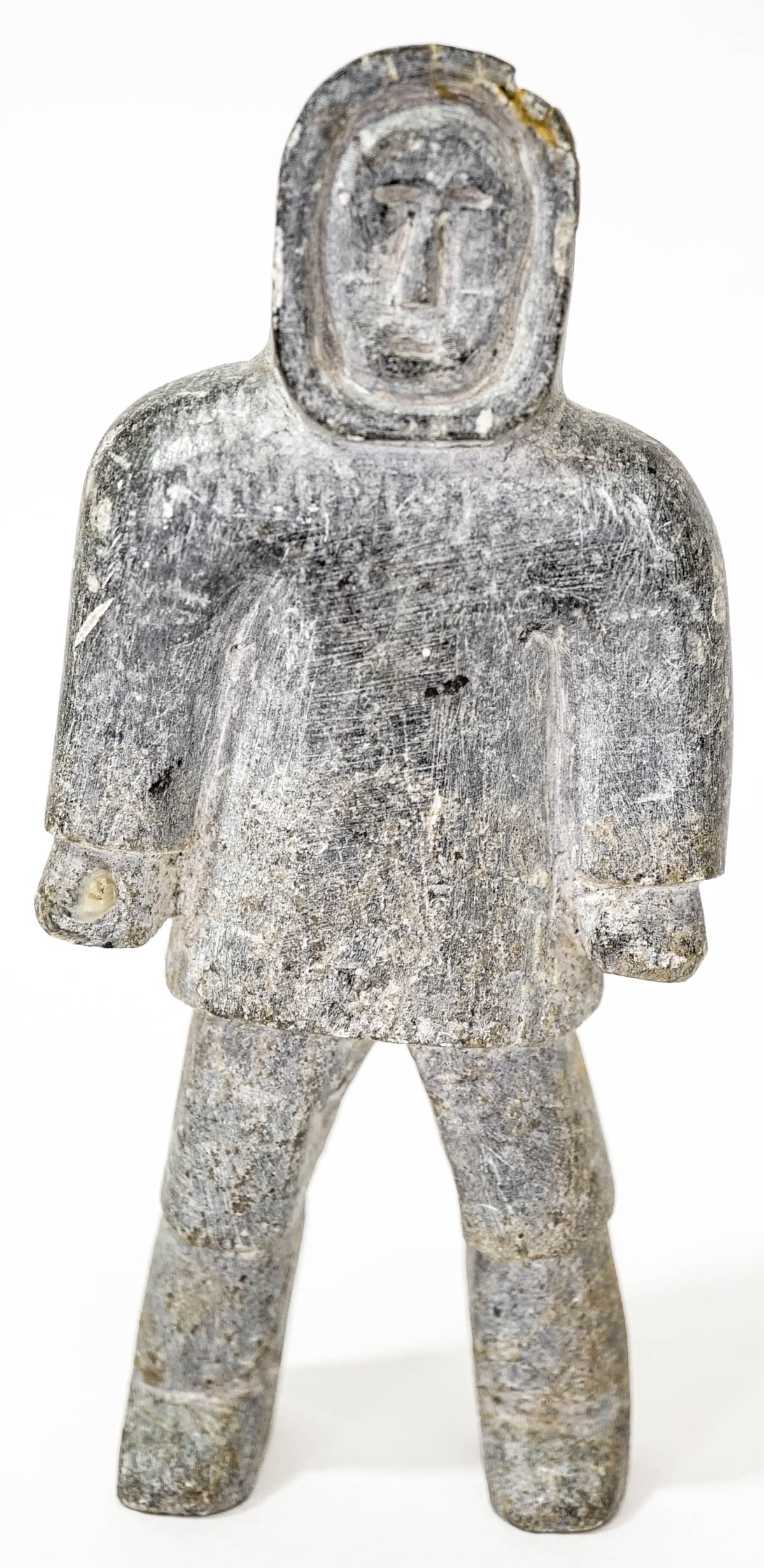 Inuit Carving Man Standing AS-IS: Inuit carving measures 5.75 x 2.5 x 1.5 in. Chipping at edges. Item measures 5.75 x 2.5 x 1.5 in. for shipping purposes. The absence of a condition report does not imply that the lot is in perfect con