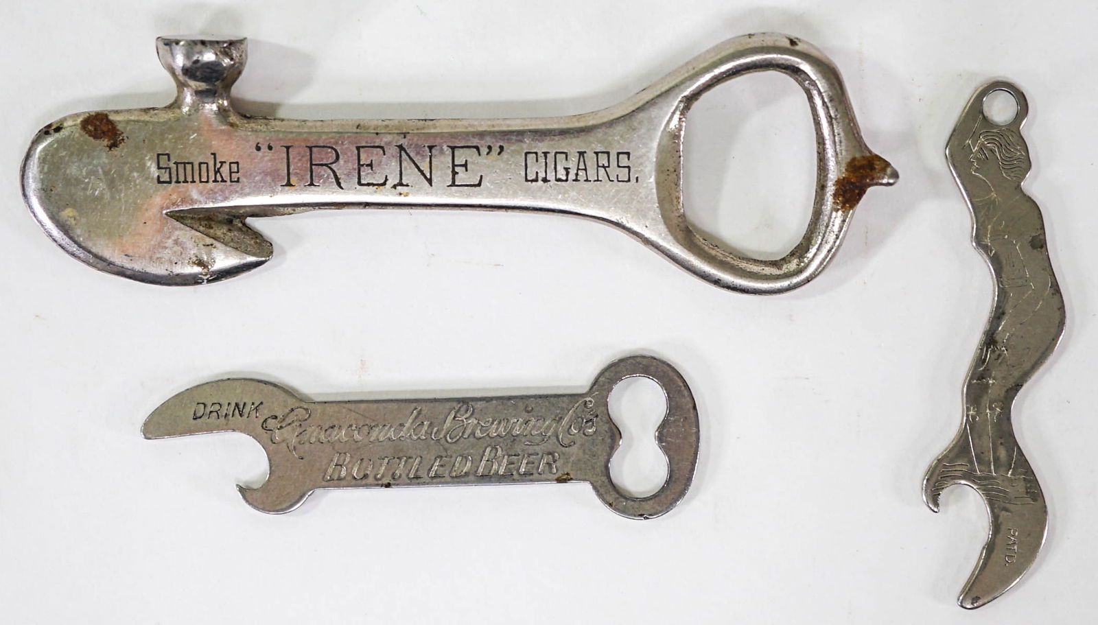 RARE (3) Montana Bottle Openers: Three (3) bottle openers measure 3 to 4.75 in. long. Lot measures 4.75 x 3.5 x 1 in. for shipping purposes. The absence of a condition report does not imply that the lot is in perfect condition or com