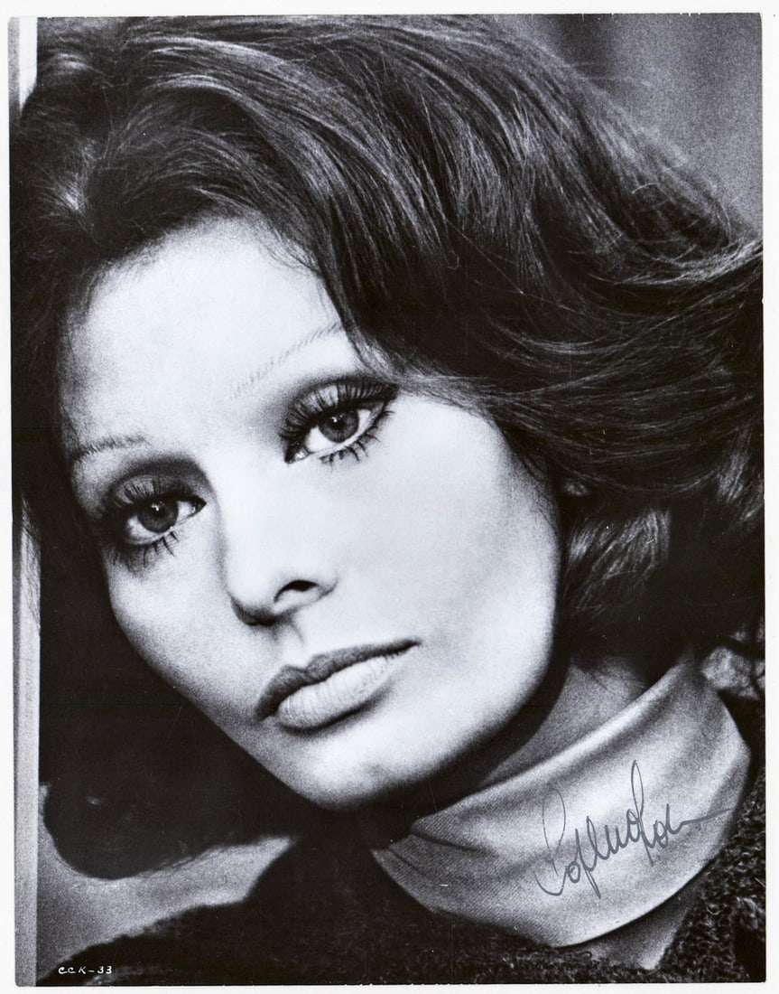Sophia Loren 8x10 Photo SIGNED BAS COA: Beckett Authentication Services #BT66393. Lot measures 8 x 10 x .125 in. for shipping purposes. The absence of a condition report does not imply that the lot is in perfect condition or completely free