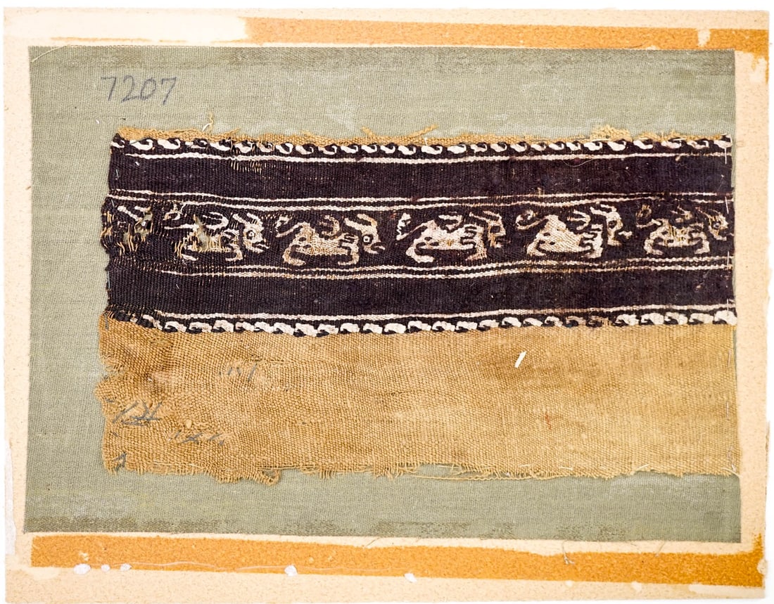 Textile Fragment, Coptic 300-600 A.D. [Egypt]: Textile Fragment, Coptic 300-600 A.D., Early Christian, Egypt. Fragment measures 9 x 4.75 inches. Partially mounted, not fully mounted. Partially matted to mat board with linen between. Measures 10.62