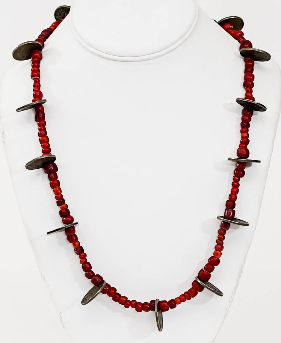 Necklace Beaded with Foreign Coins: Necklace with red beads and 14 foreign coins stringed without clasp with an 11 inch drop. Lot measures 3.5 x 3.5 x 1 in. for shipping purposes. The absence of a condition report does not imply that th