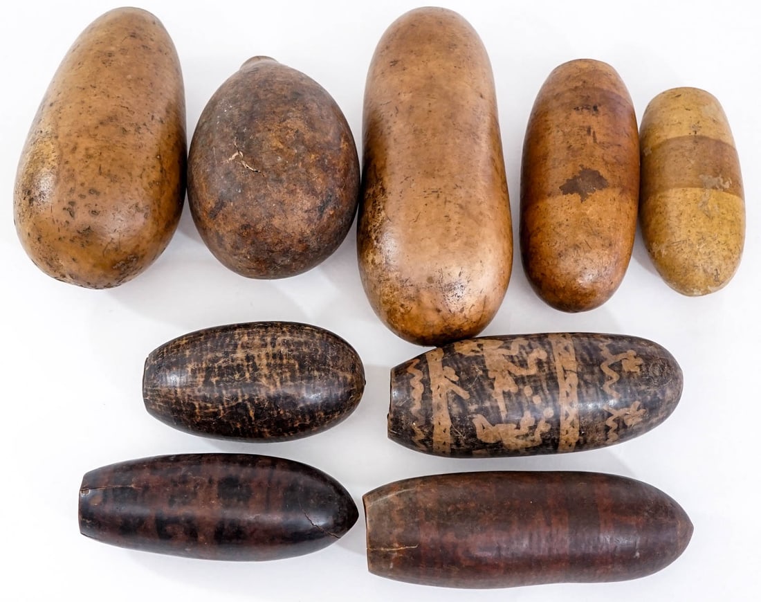 Hand Decorated (9) Gourds [Latin America]: Measure 5.5 to 10 in. tall with 8 to 14 in. girths. Several with cracks / chips. Lot measures 16 x 16 x 4 in. for shipping purposes. The absence of a condition report does not imply that the lot is in