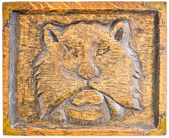 An Antique Carved Oak Panel with Lion