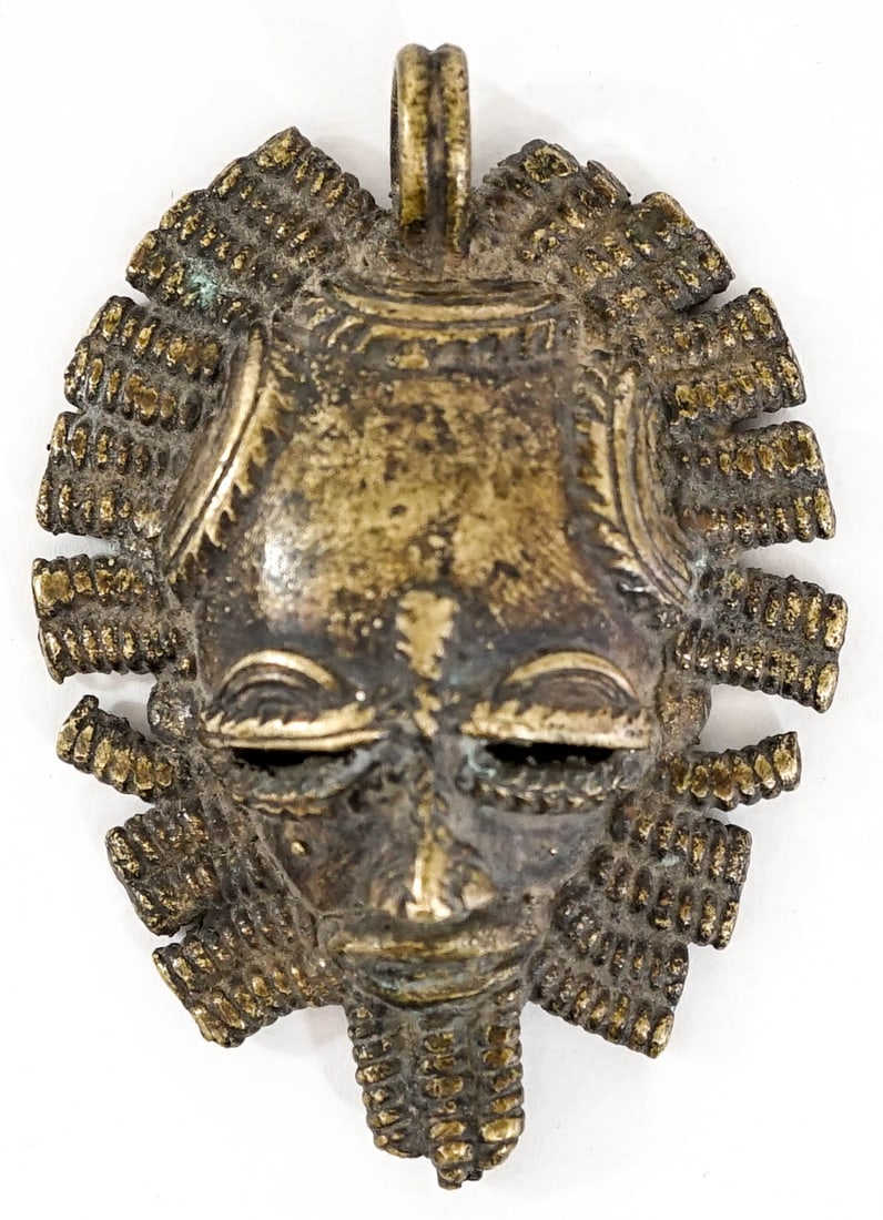 Vintage Bronze Pendant [Mask]: Pendant measures 3 x 2.125 in. Lot measures 3 x 3 x 1 in. for shipping purposes. The absence of a condition report does not imply that the lot is in perfect condition or completely free from wear and