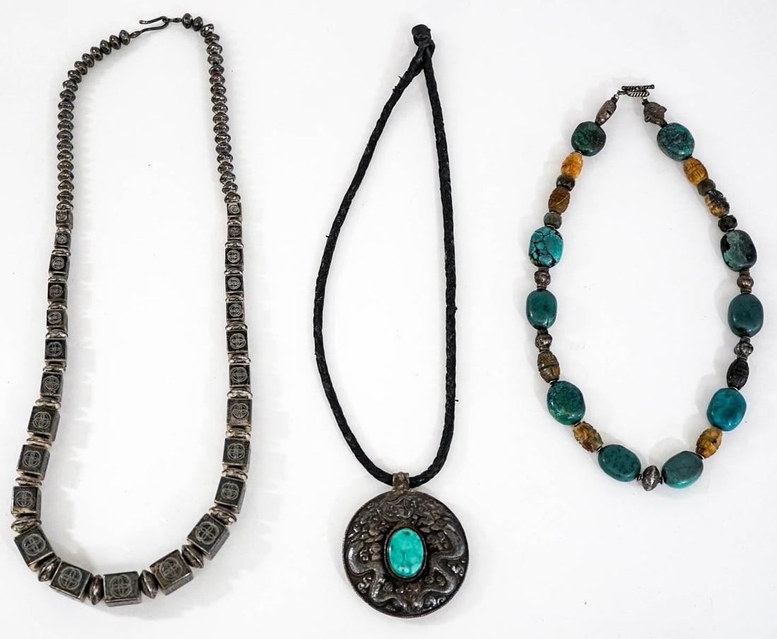Necklaces (3) Assorted [Turquoise]: Include: 1) Pendant with turquoise stone measures 2.25 in. diameter and includes a fabric necklace. 2) Turquoise beaded necklace measures 19 in. total length. Turquoise stones measure 19mm, includes s