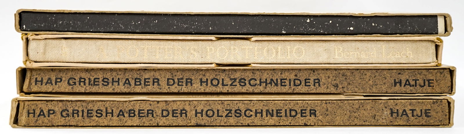 (4) Large Art & Ceramics Books: 1. (2) HAP Grieshaber, der Holzschneider, with separate text booklet in pocket at rear by Margot Fuerst. PUBLISHED BY GERD HATJE, STUTTGART, 1964. BOUND WITH HAND MADE BROWN ILLUSTRATED PAPER DUST JAC