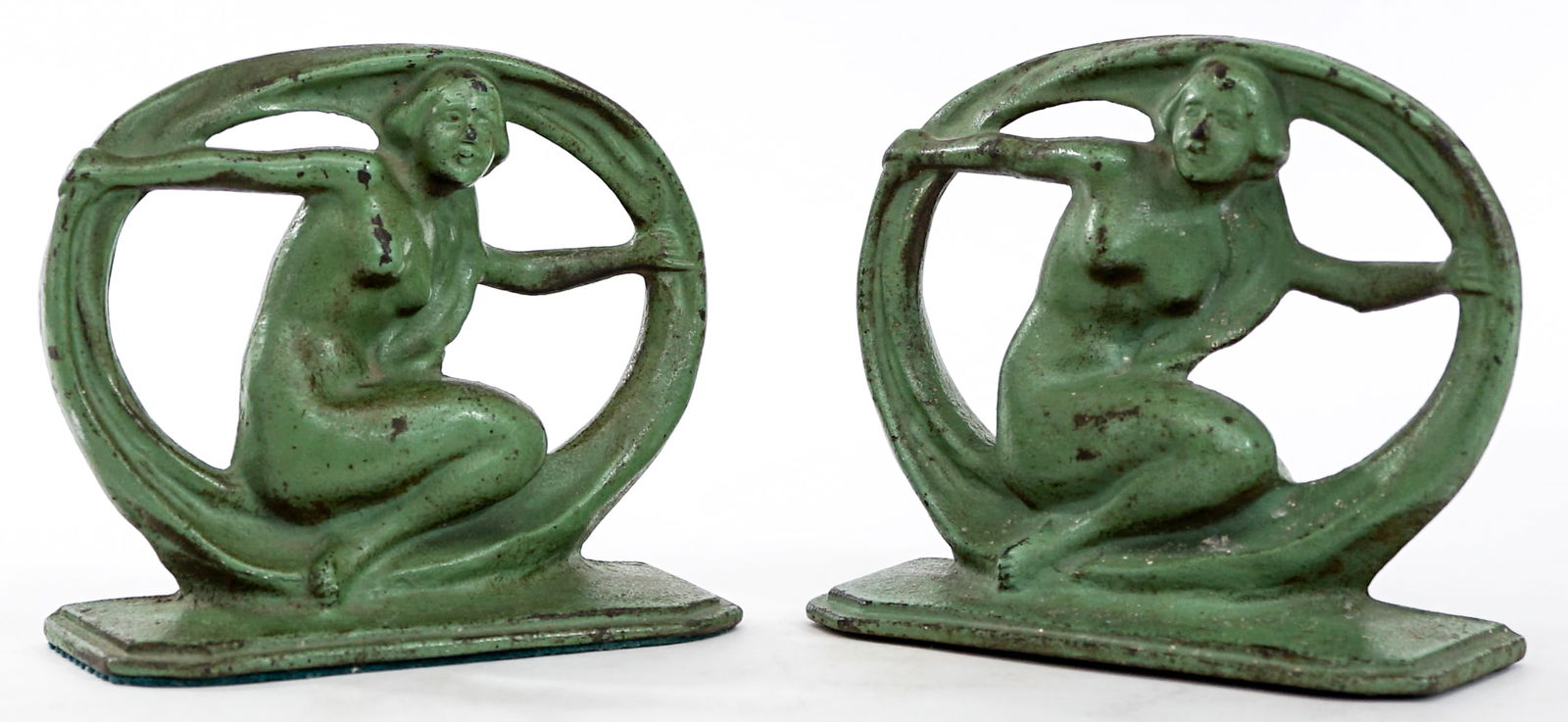 Art Deco Cast Iron Pair Bookends [Nude]: Pair of cast iron bookends. Some paint loss. EACH measures 5 x 6 x 2.25 inches. Measures 5 x 6 x 4.5 inches for shipping purposes. The absence of a condition report does not imply that the lot is in p