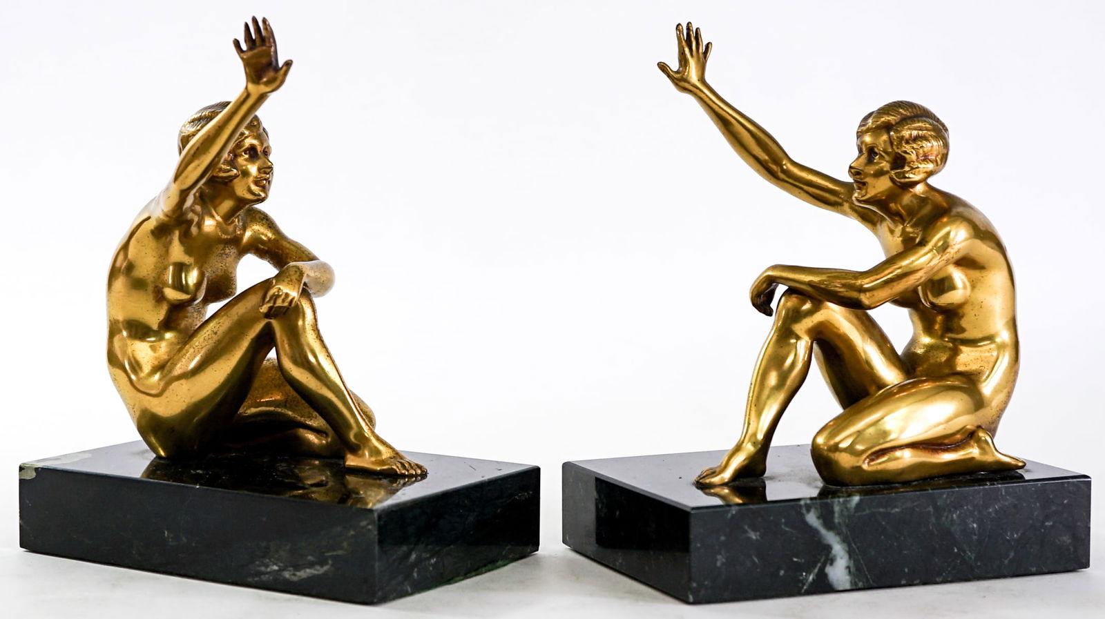 Art Deco Metal Pair Bookends [Nude]: Pair metal bookends with marble stand. EACH measures7 x 5.5 x 3.5 in. Measures 7 x 5.5 x 7 inches for shipping purposes. The absence of a condition report does not imply that the lot is in perfect con