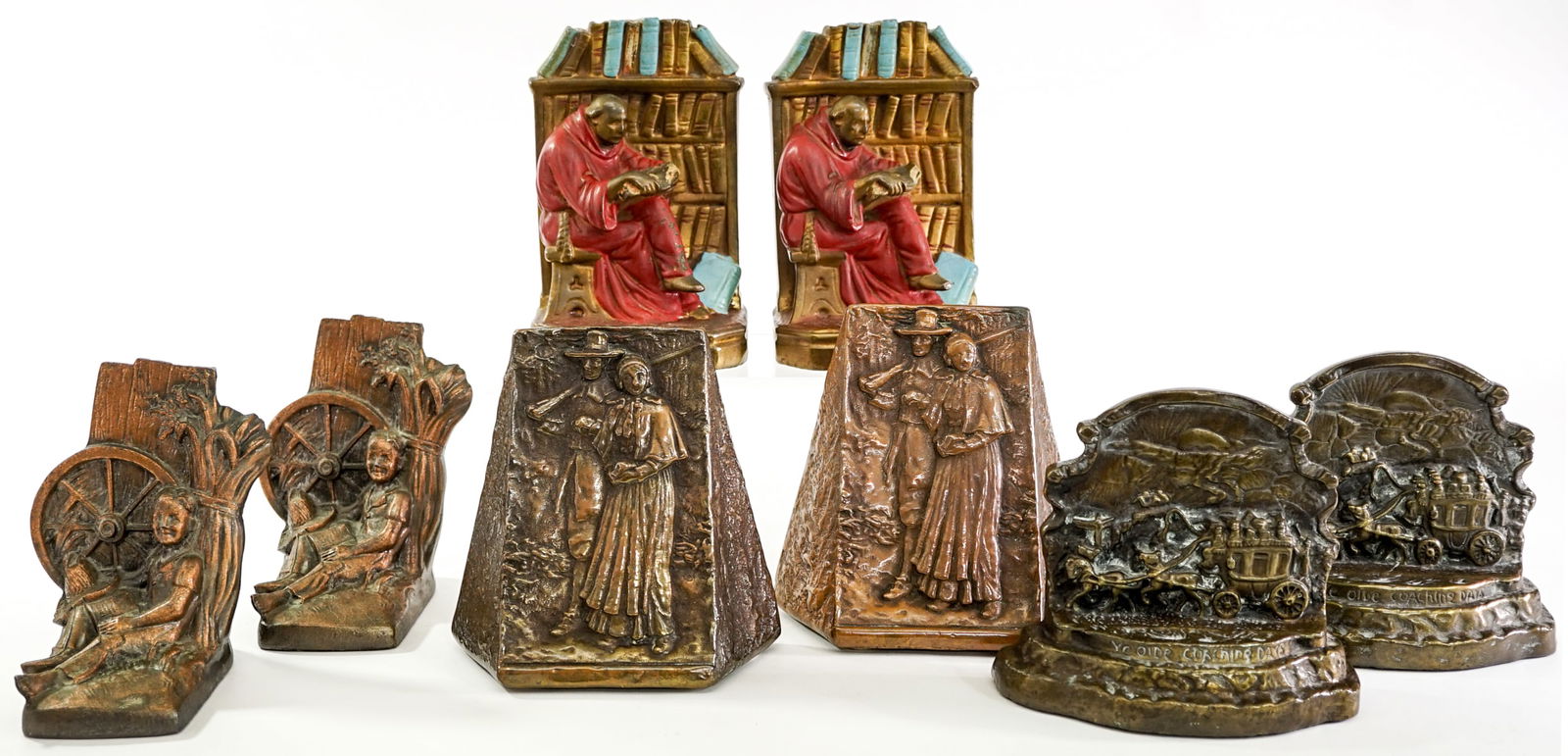 Vintage (4 Pair) Cast Metal Bookends: 1) Armor Bronze 'Ye Olde Coaching Days' stagecoach measures 5.25 x 6 x 2.5 in. each. 2) PM 'Tom Sawyer - Huck Finn' measures 5.5 x 4.25 x 4.25 each. 3) Armor Bronze Scholar Reading in Library measures