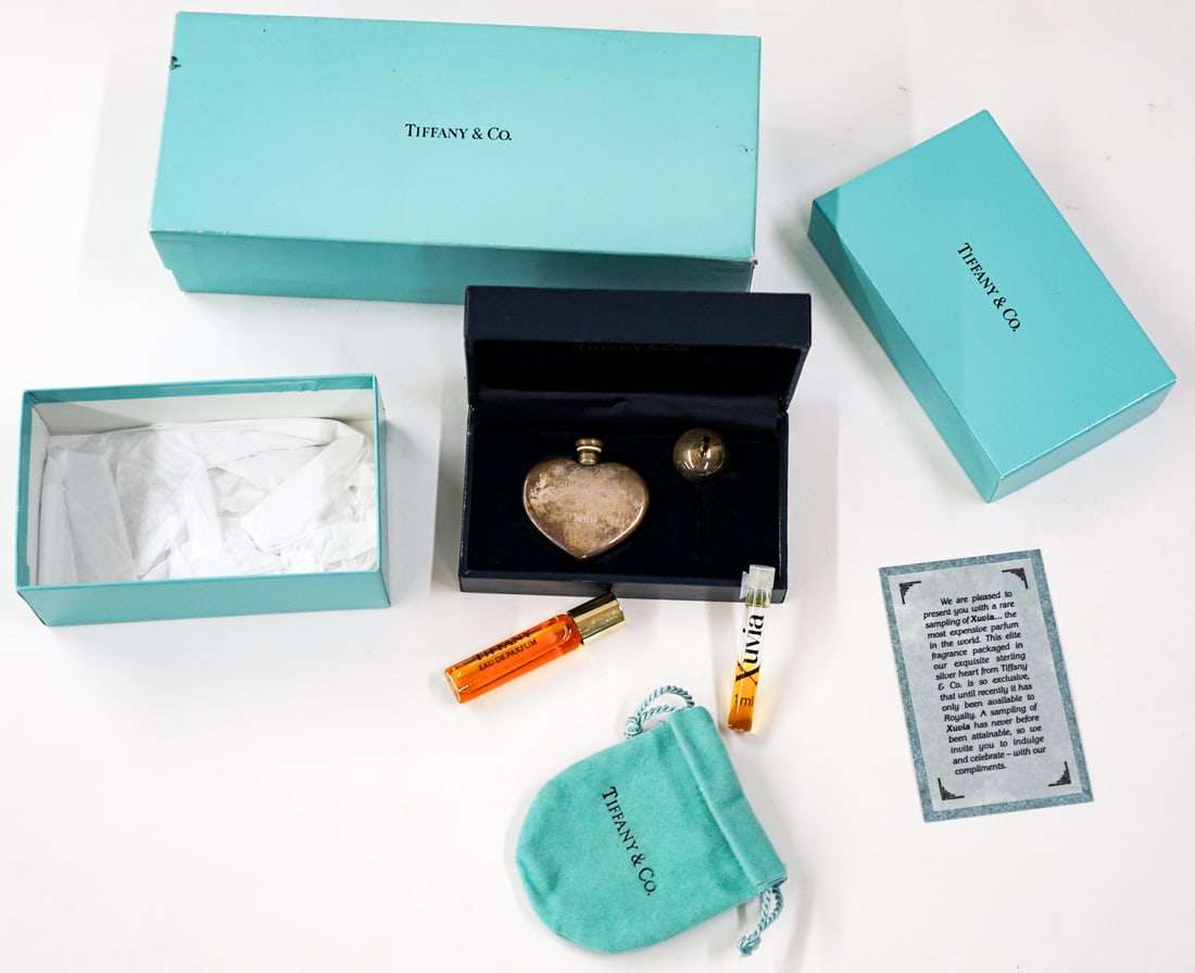 Xuvia Perfume, Tiffany & Co. Sterling Perfume: Xuvia used to sell in Saks Fifth Avenue for thousands a bottle. One time was THE MOST EXPENSIVE PARFUME IN THE WORLD. No longer available to public Tiffany & Co. sterling perfume. All mint in the box.