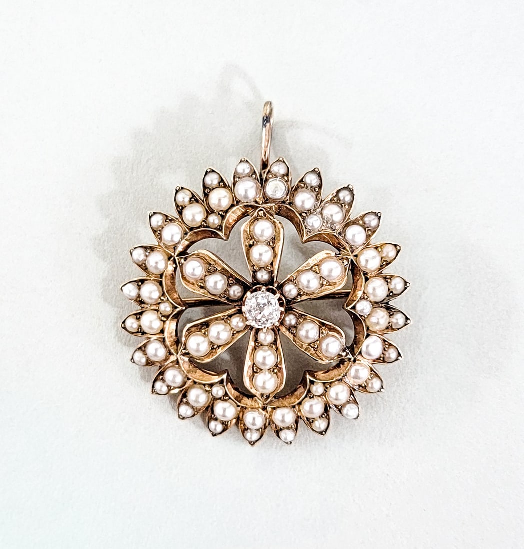 14k Gold, Diamond & Seed Peark Pin/Pendant: Measures 1.375 x 1.125 inches. Weighs 8.12 grams. Center diamond measures approximately .20ct. For shipping purposes measures 1.5 x 1.5 x 1 inches. The absence of a condition report does not imply tha