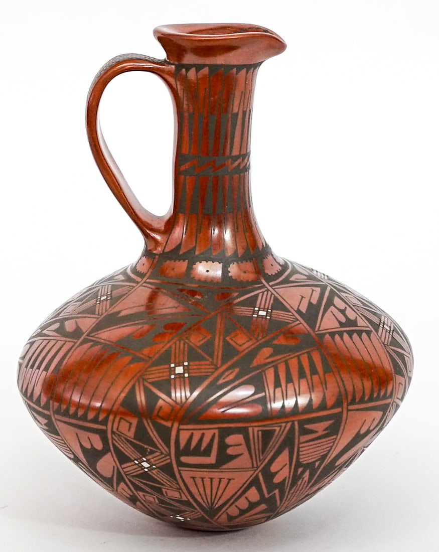 Luis Arturo Lopez SIGNED Pitcher [Polychrome]: Luis Arturo Lopez (Mata Ortiz) pottery pitcher. Signed underside. Measures 8.75 tall x 5.5 x 5.5 in. No evident cracks, chips or repairs. Measures 8.75 x 5.5 x 5.5 in. for shipping purposes only. The