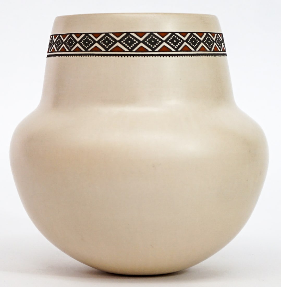 Talvo Silveira SIGNED Polychrome Pottery Olla: Talvo Silveira (Mata Ortiz) pottery vase signed underside. Measures 4 in. across rim x 6.75 in. tall x 6.25 in. across shoulders. No evident cracks, chips or repairs. Measures 6.75 x 6.25 x 6.25 in. f