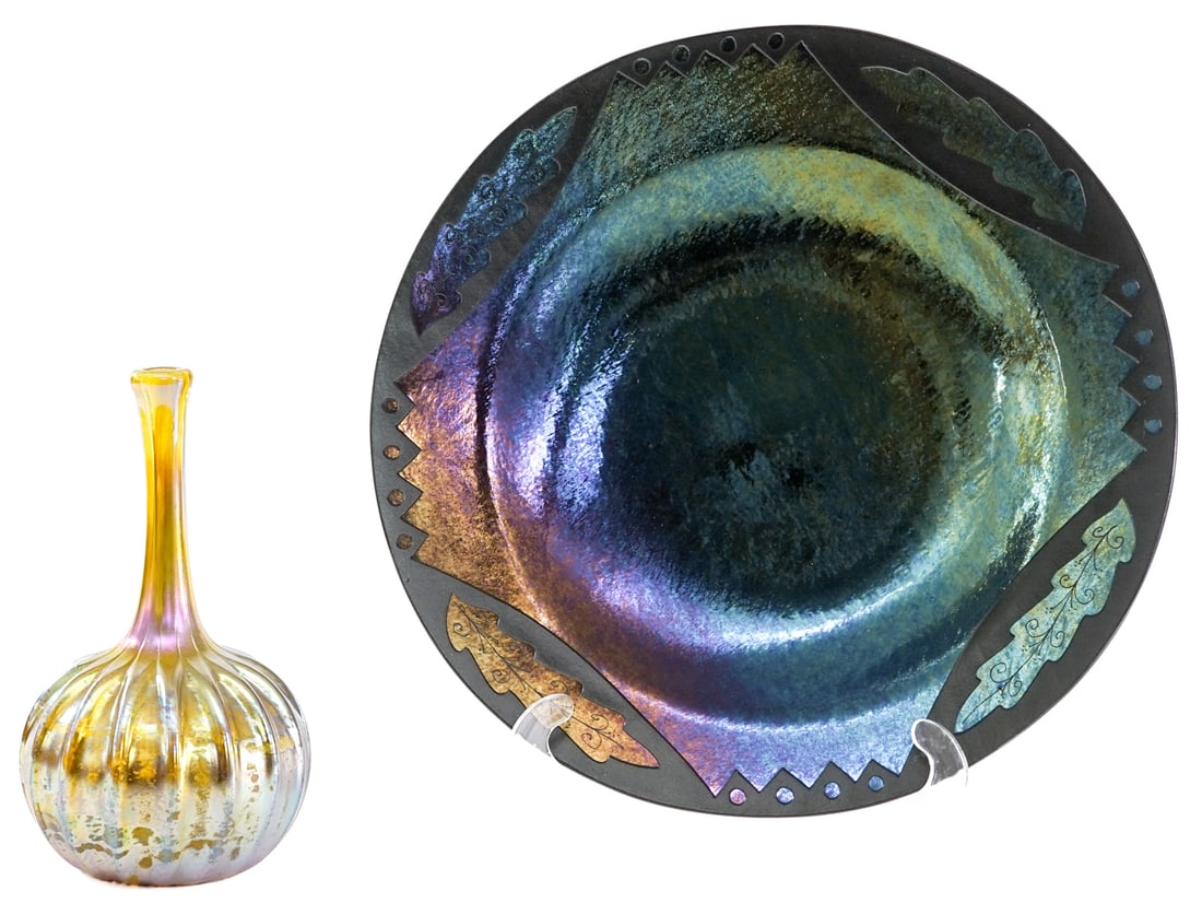 Studio Art Glass Vase and Charger [Lynn Latimer]: Includes: 1) 12.5 inch x 1.75 inch charger signed Lynn Latimer. 2) Iridescent 8 in. Bud Vase No evident cracks, chips or repairs. Measures 12.5 x 12.5 x 10 in. for shipping purposes only. The absence