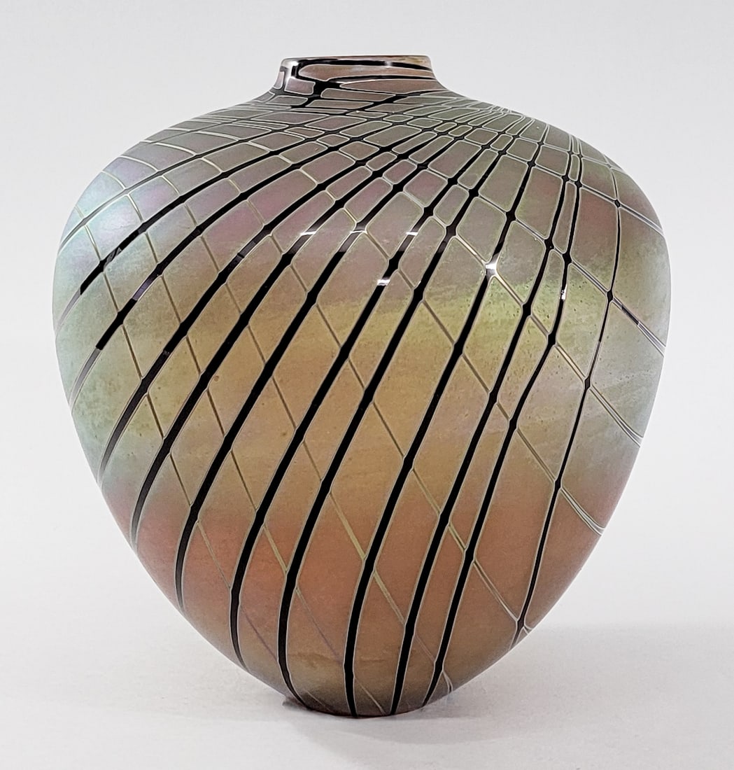 Craig Zweifel SIGNED Iridescent 10IN Vase 1994: Craig Zweifel vase measures 10 in. x 9.5 x 9.5 and 2.125 in. across rim. No evident cracks, chips or repairs. Lot measures 10 x 9.5 x 9.5 in. for shipping purposes only. The absence of a condition rep