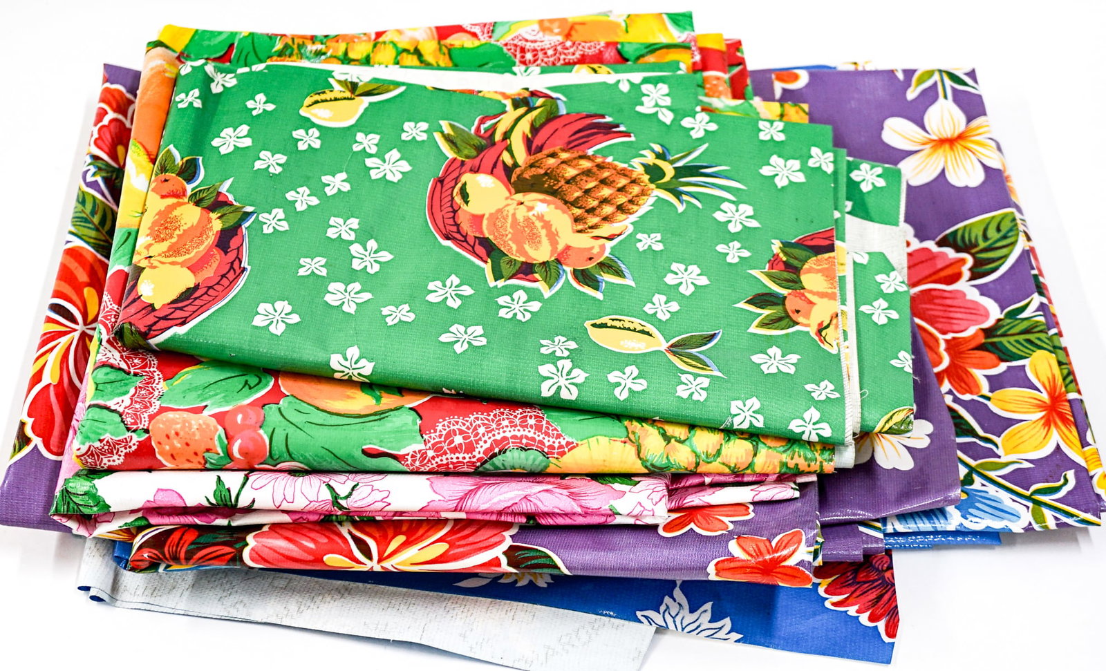 NOS Group of Mexican Oil Cloth: New Old Stock group of Mexican Oil Cloth. For shipping purposes the lot measures 20 x 16 x 4 inches. The absence of a condition report does not imply that the lot is in perfect condition or completely