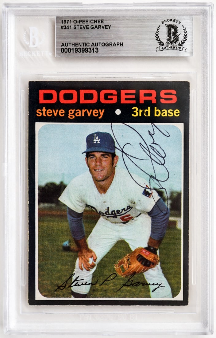 Steve Garvey Signed O-Pee-Chee Rookie Card: The card appears to be EX/EX-MT. However, the condition report is provided as an opinion only and in no way is a guarantee nor warranty if card or cards are submitted to a third party grading company.