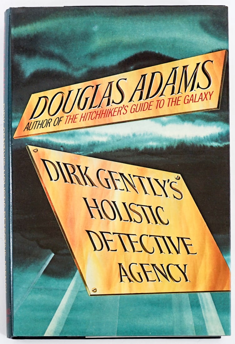 Douglas Adams - Dirk Gently's Agency SIGNED 1987: Dirk Gently's Holistic Detective Agency by Douglas Adams signed on title page. Simon and Schuster 1987 1st edition with unclipped dust jacket. 247 pp. Two-tone black covers. Book lot measures 8.75 in.
