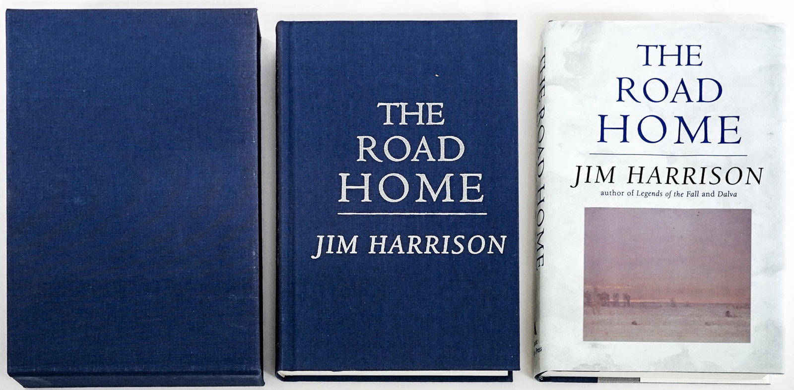 Jim Harrison (2) The Road Home SIGNED: 1) Atlantic Monthly 1998 1st with unclipped dust jacket. 446 pp. Two-tone covers. 2) Limited slipcase version. Atlantic Monthly 1998 1st. 446 pp. Blue covers with silver lettering. Numbered 91 of 250