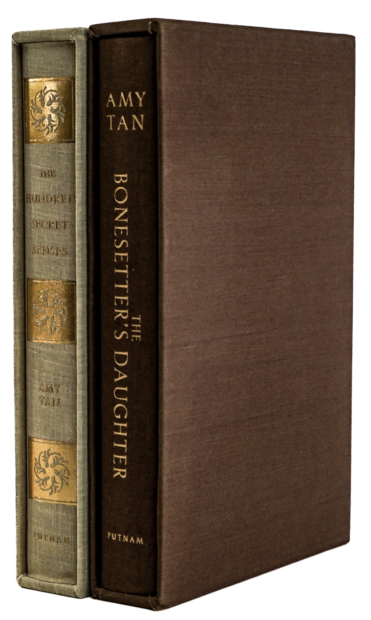 Amy Tan (2) S/N Slipcased Books: 1) The Hundred Secret Senses numbered 98 of 175 copies. G. P. Putnam 1995 1st with cloth covers and slipcase. 355 pp. 2) The Bonesetter's Daughter numbered 188 of 200 copies. G. P. Putnam 1st with