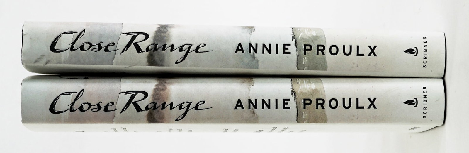 Annie Proulx (2 Copies) Close Range SIGNED: Close Range - Wyoming Stories by Annie Proulx with watercolors by William Matthews. One copy is author signed and one copy is illustrator signed. Scribner 1999 1st with unclipped dust jacket. 283 pp.