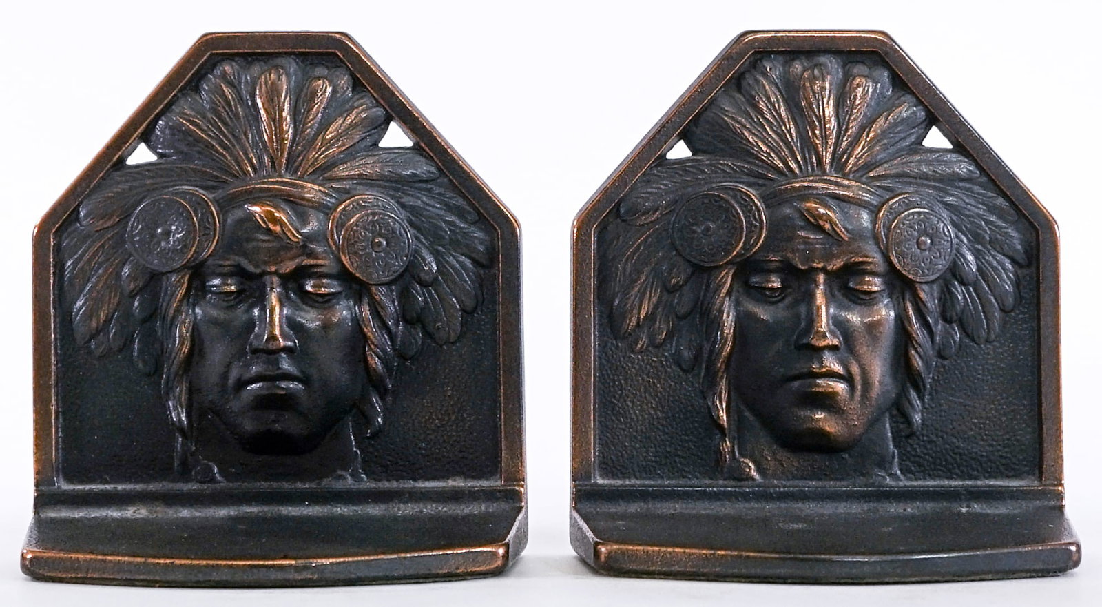 JUDD 9898 (Pair) Cast Iron Bookends: JUDD 9898 Native American Chief pair cast iron bronze bookends. EACH measures 5.5 x 5 x 2.75 in. Lot measures 5.5 x 5 x 5.5 inches for shipping purposes. The absence of a condition report does not imp